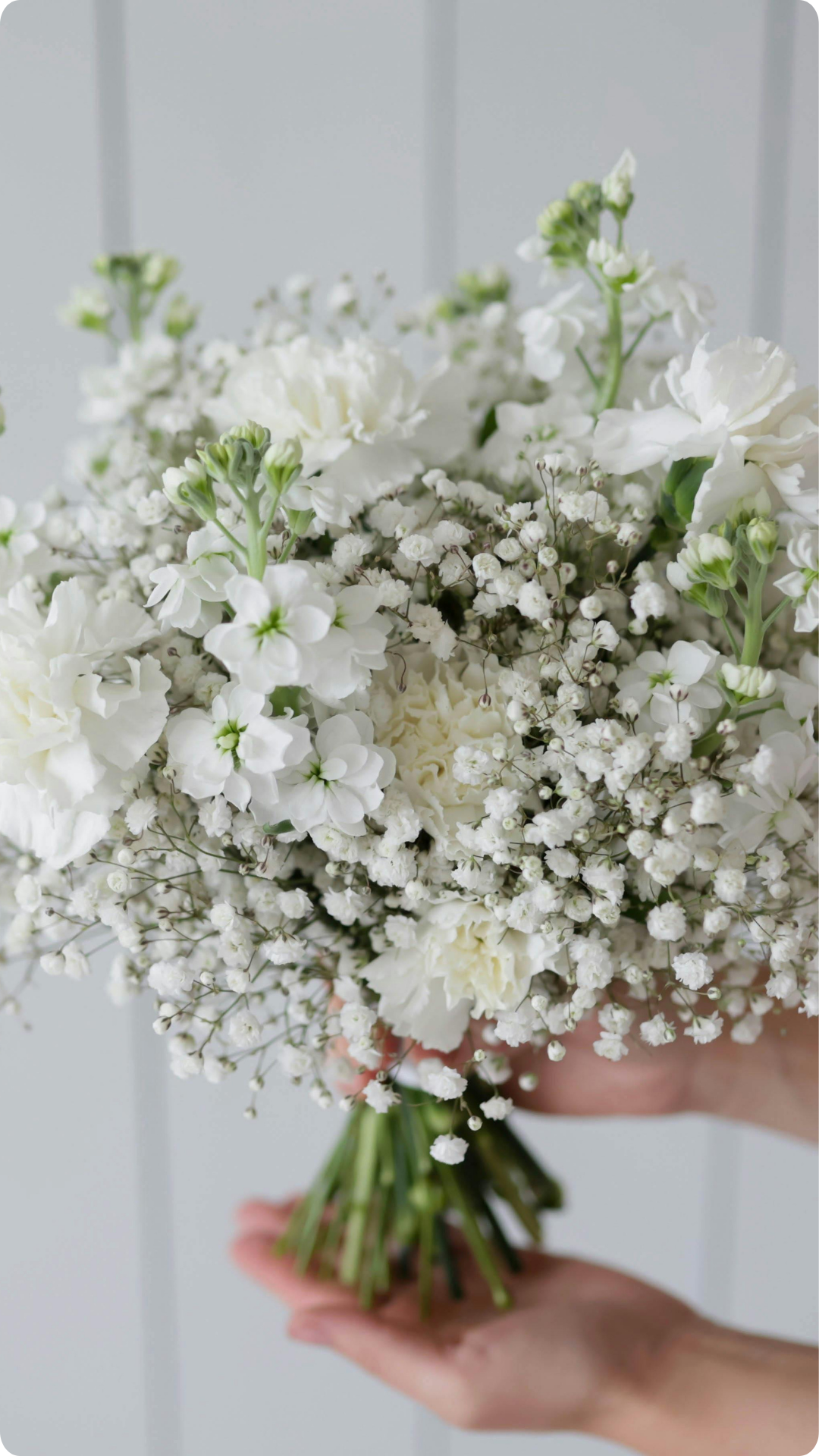 White wedding bouquet with gypsophila